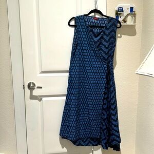 Navy blue with lighter blue patterns, asymmetric hem. Size 12 generous.